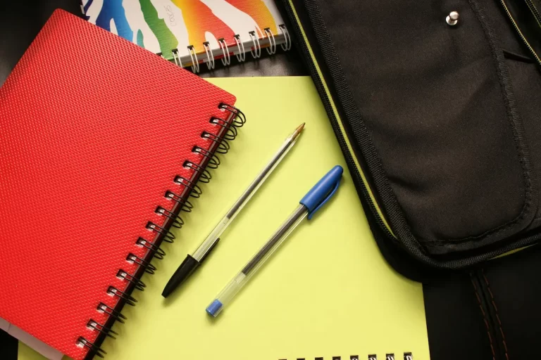 overpreparation in photography suggested by notebooks and pens prepared in advance